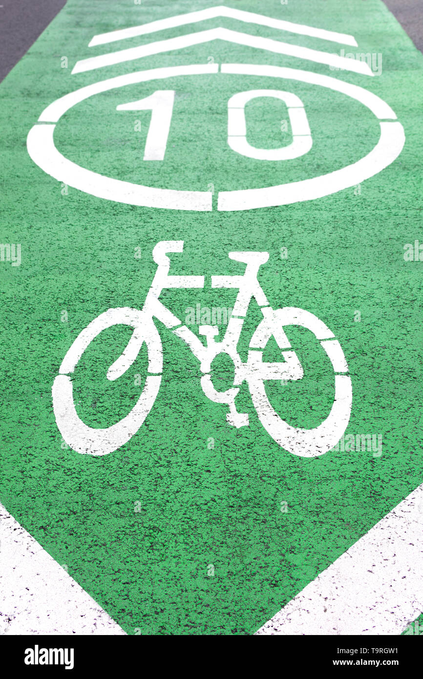 Background of bicycle traffic signs on the asphalt. Stock Photo