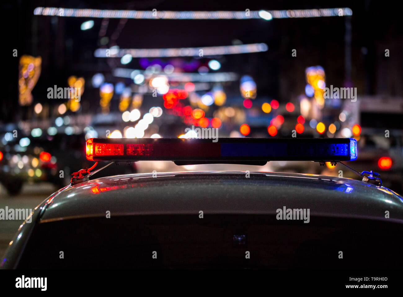 police car lights at night in city with selective focus and bokeh Stock ...