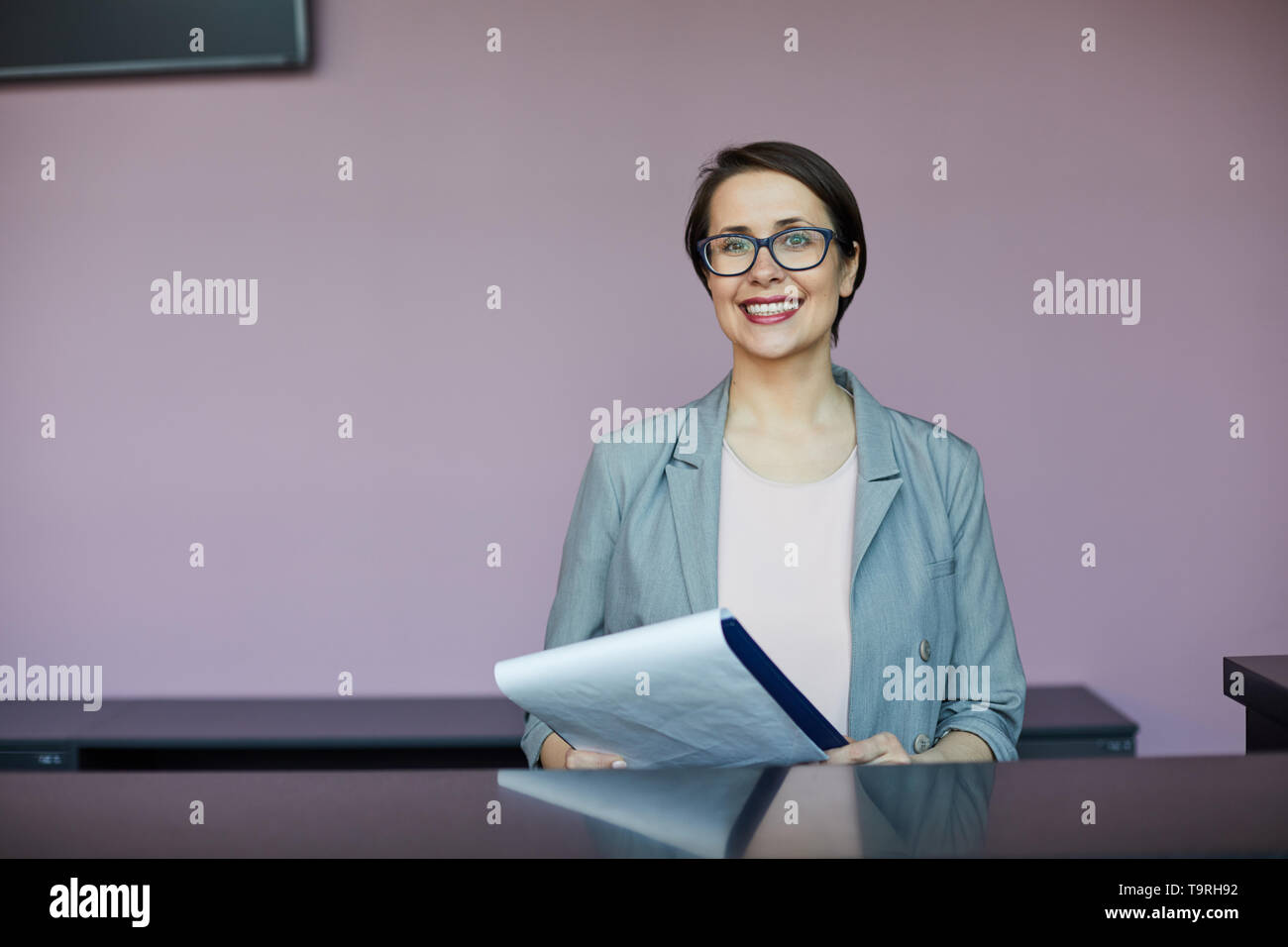 Happy pretty woman being interviewed by recruiter Stock Photo