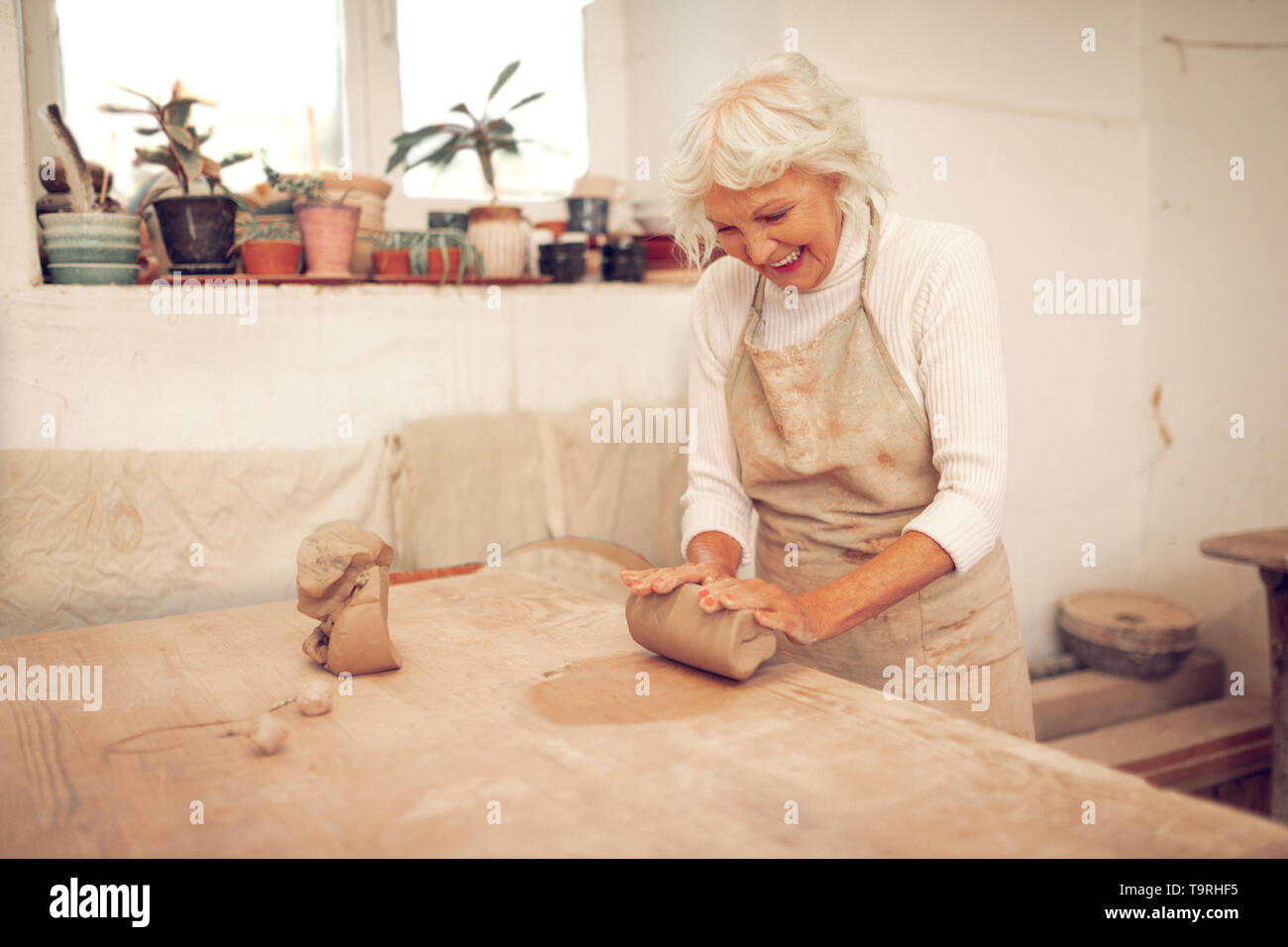 Positive happy woman being in a great mood Stock Photo