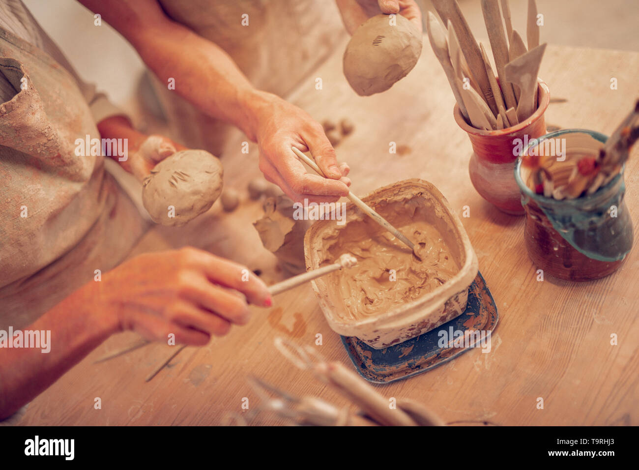 Top view of a bowl with melted clay Stock Photo - Alamy