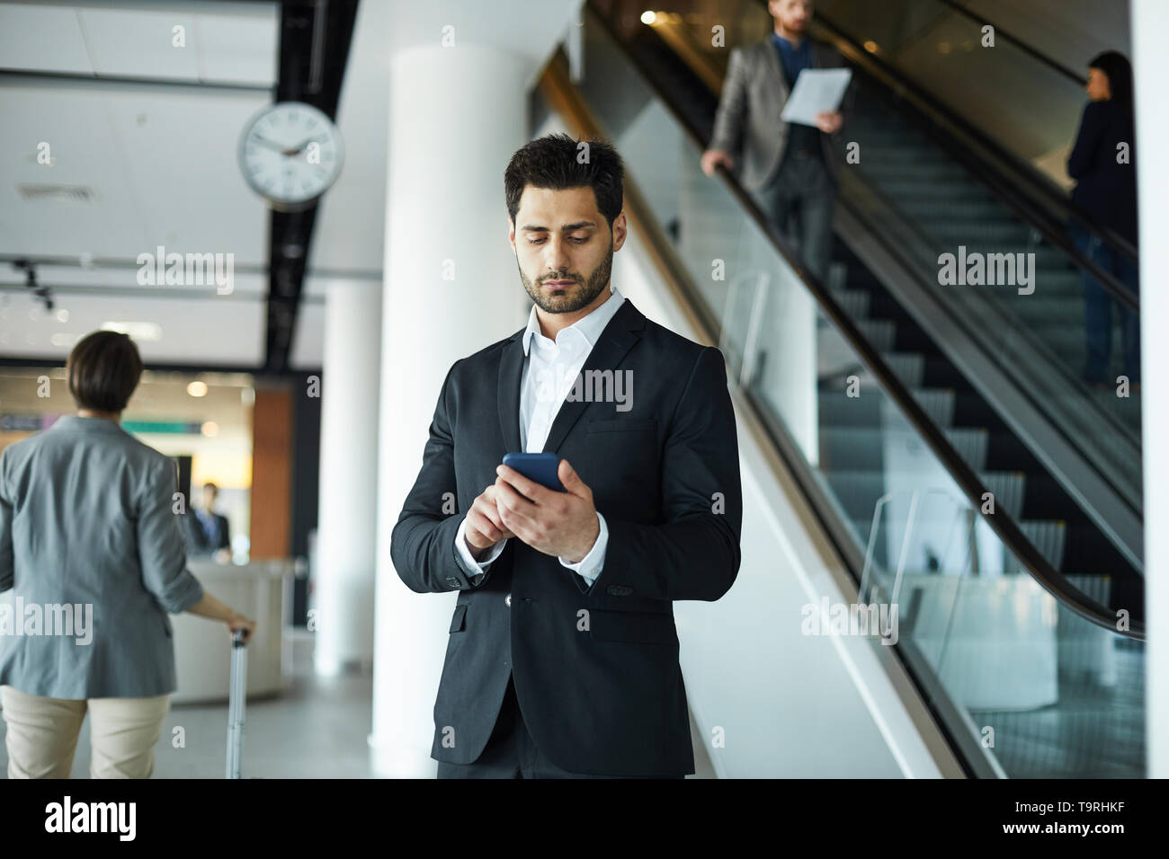 Handsome businessman browsing internet Stock Photo