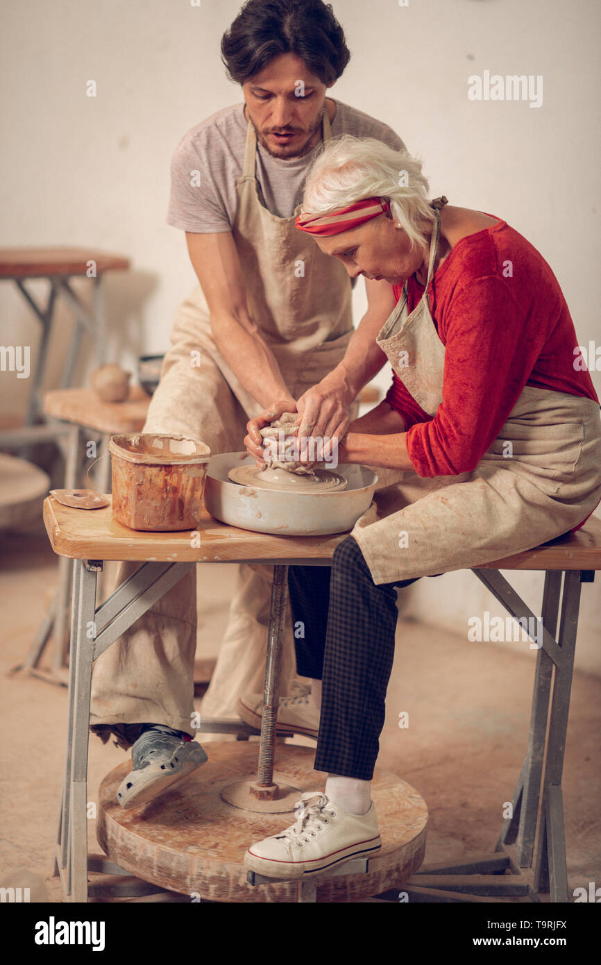 Pleasant nice woman being involved in her work Stock Photo