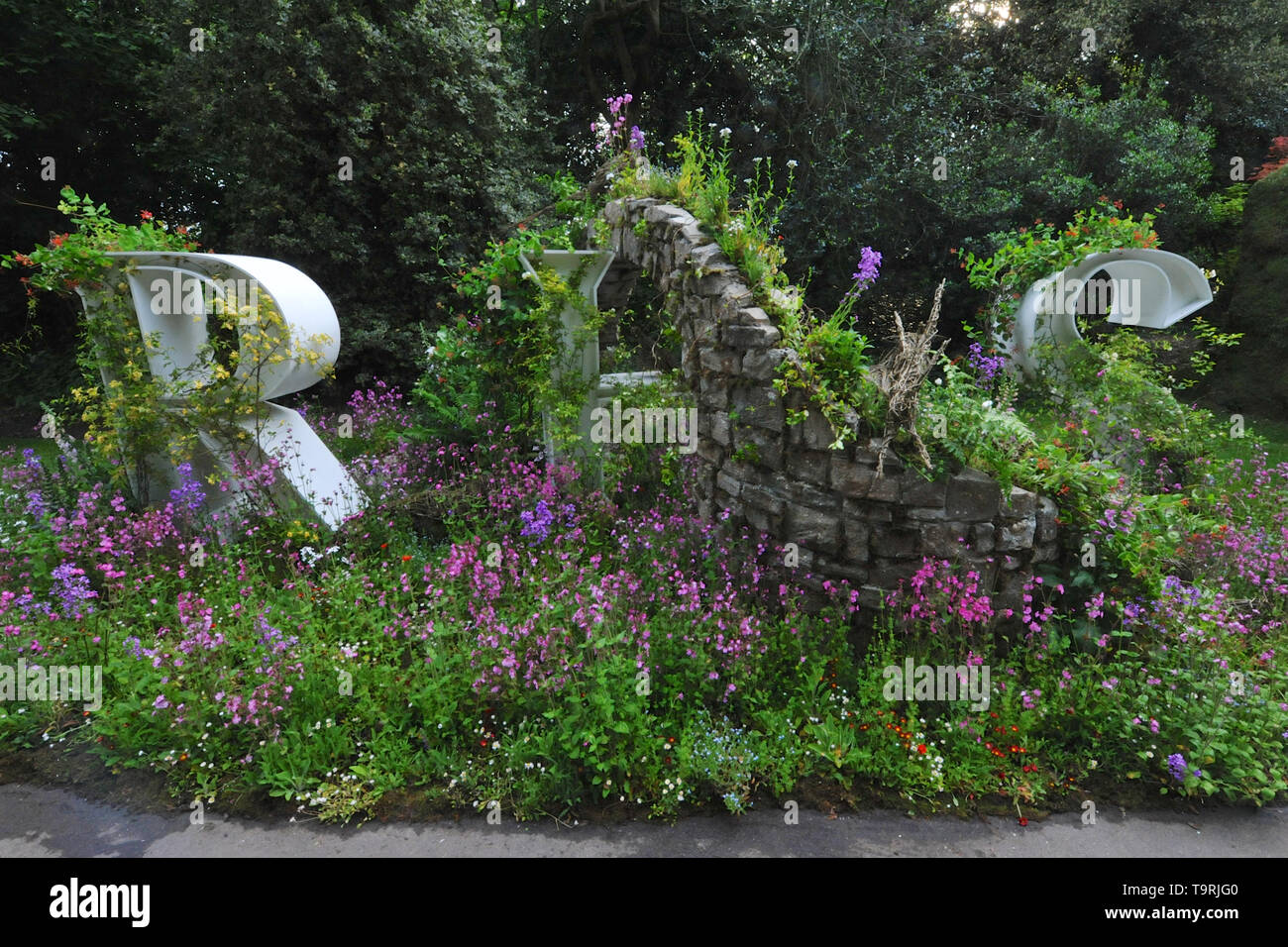 Wild Walls, an installation wrapping around the letters RHS (Royal Horticultural Society) on display at the 2019 RHS Chelsea Flower Show which opened today in the 11-acre grounds of the Royal Hospital Chelsea, London, United Kingdom - 20 May 2019  There are 26 themed gardens on display at this year’s show as well as over 100 plant displays in the Great Pavilion. New plants are often launched at the show and the popularity of older varieties revived, it is, in effect, the garden design equivalent of a catwalk at a fashion show. Stock Photo