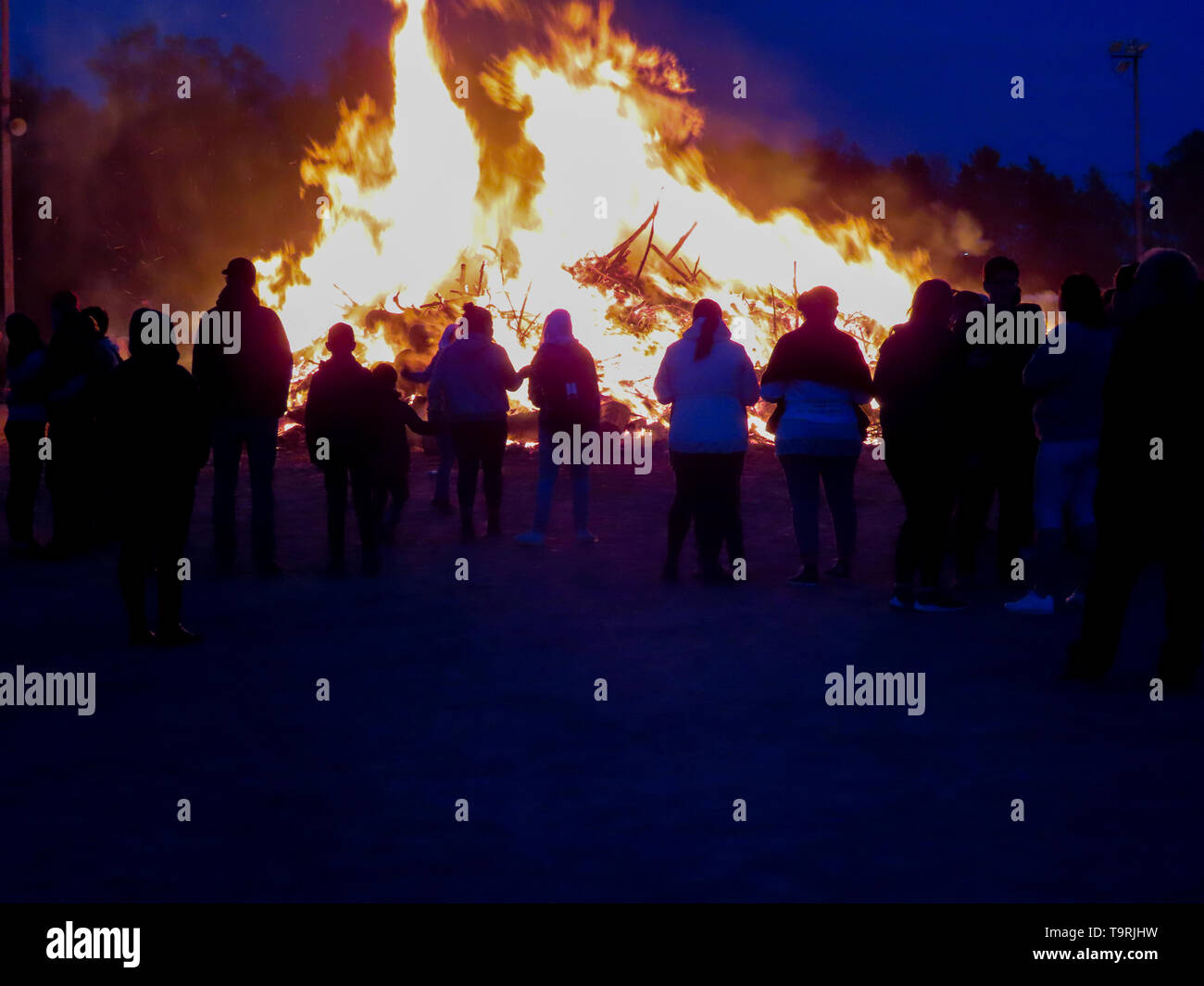 MAY FIRE at the end of april with people celebraiting spring Stock ...