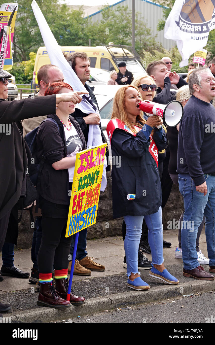 Councillor Anna Rothery takes part in a demonstration against Tommy Robinson as he campaigns in Bootle Liverpool UK for the Euro MEP elections. Stock Photo