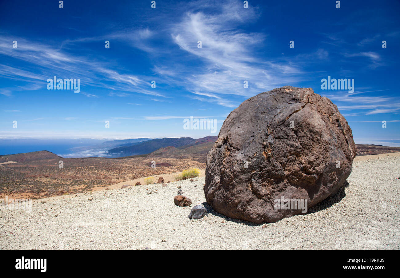 Tenerife, view from hiking path to the summit towards dark lava bombs called Huevos del Teide, Eggs of Teide Stock Photo
