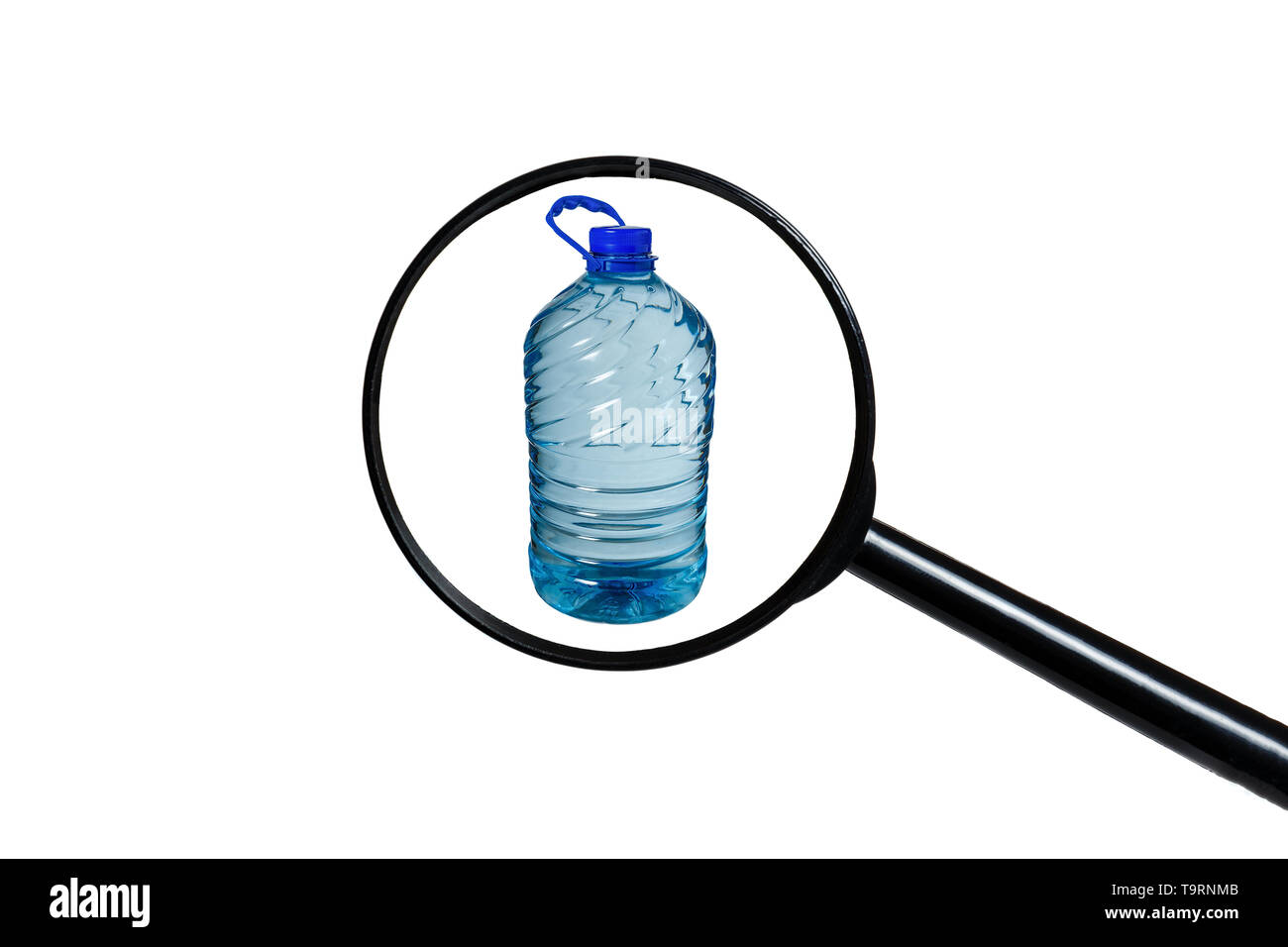 Big bottle of water isolated on a white background, view through a magnifying glass Stock Photo