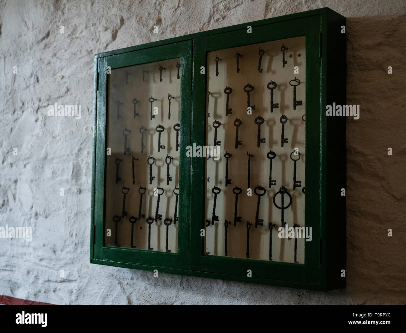Keys in a glass display cabinet. Stock Photo