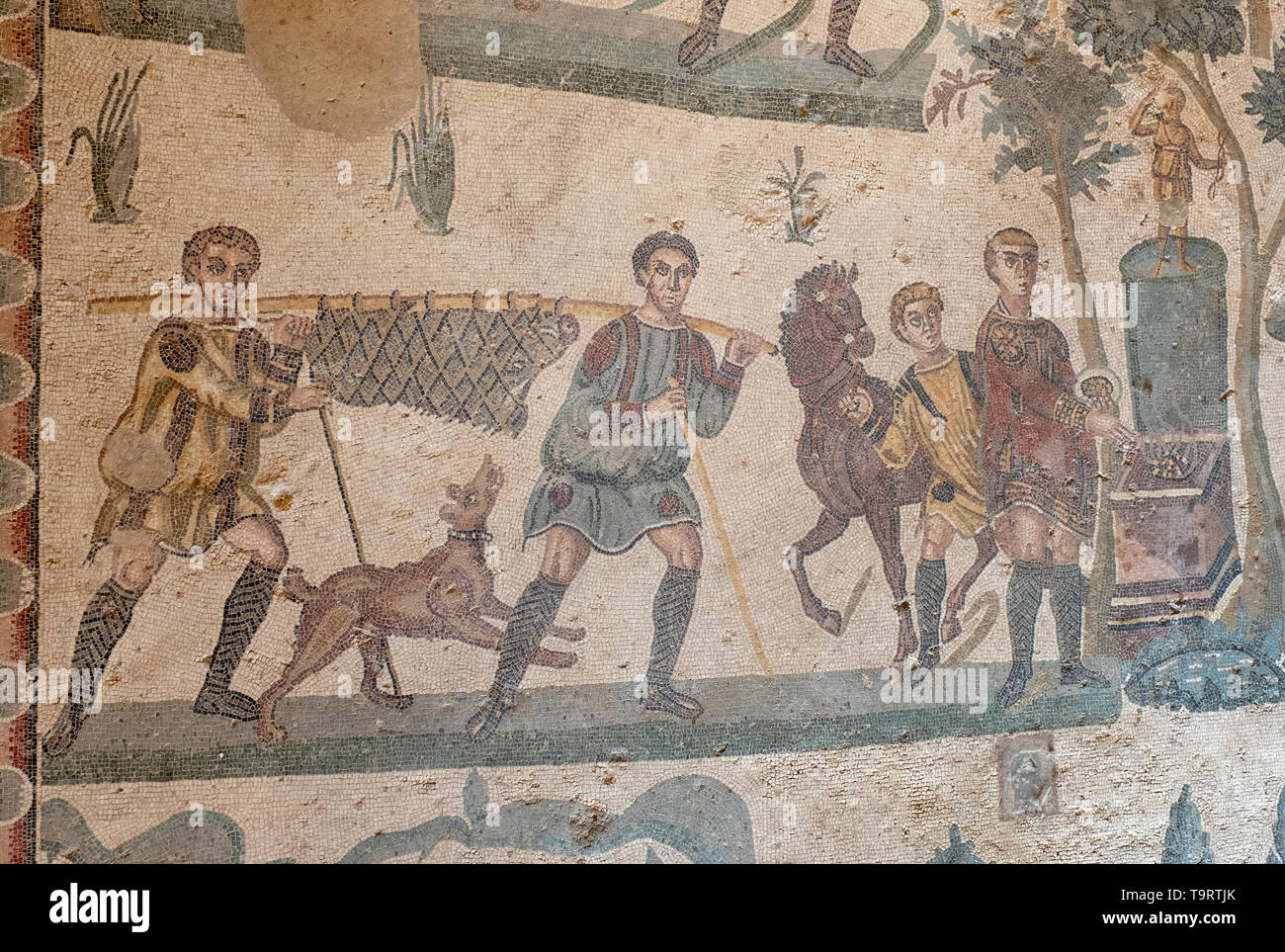 The Small Game Hunt  roman mosaic in the Villa Romana del Casale, Piazza Armerina, Sicily, Italy. Stock Photo