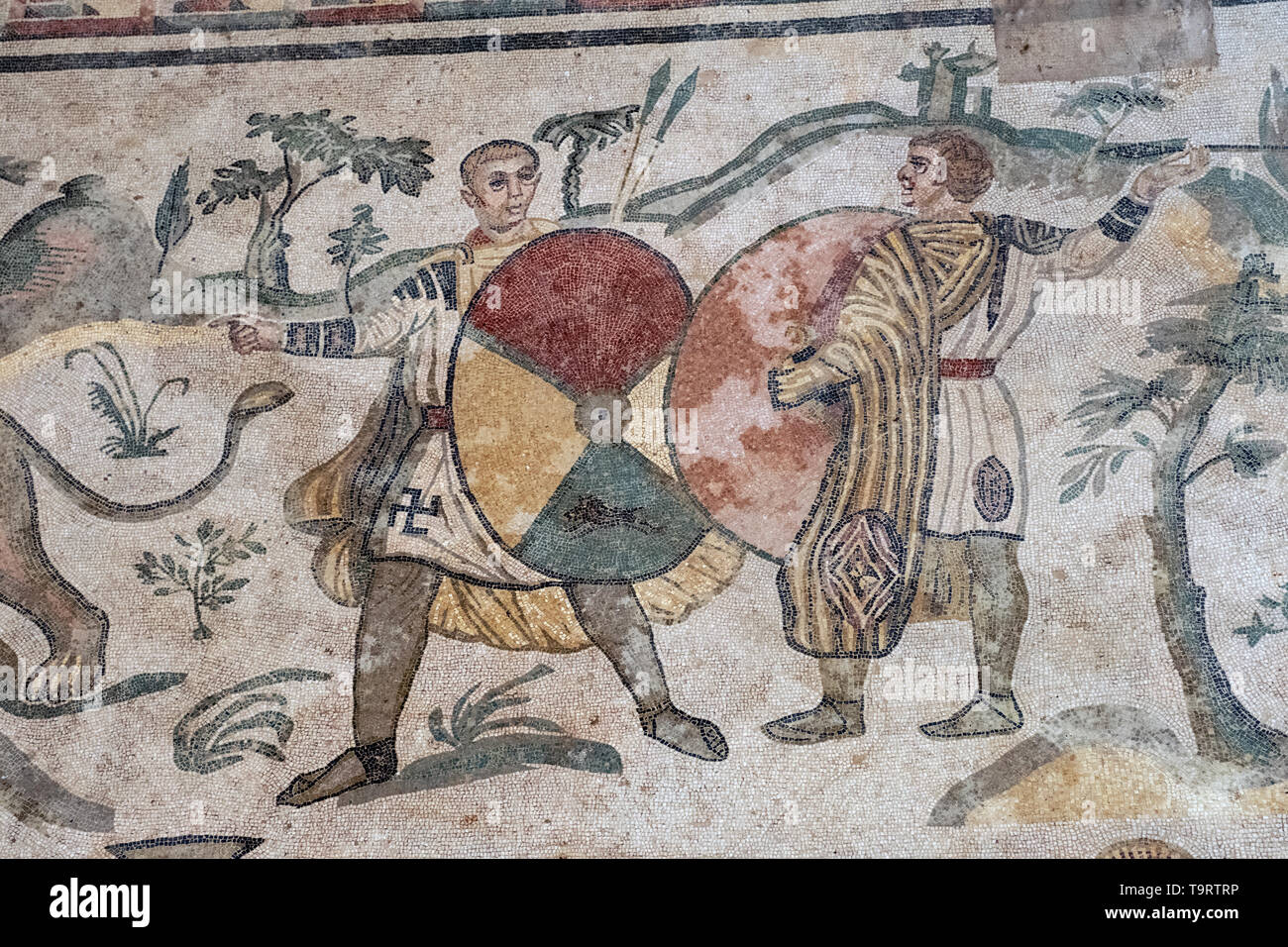 Hunters on the Great Hunt mosaic one of the Roman mosaics in the Villa Romana del Casale, Piazza Armerina, Sicily, Italy. Stock Photo