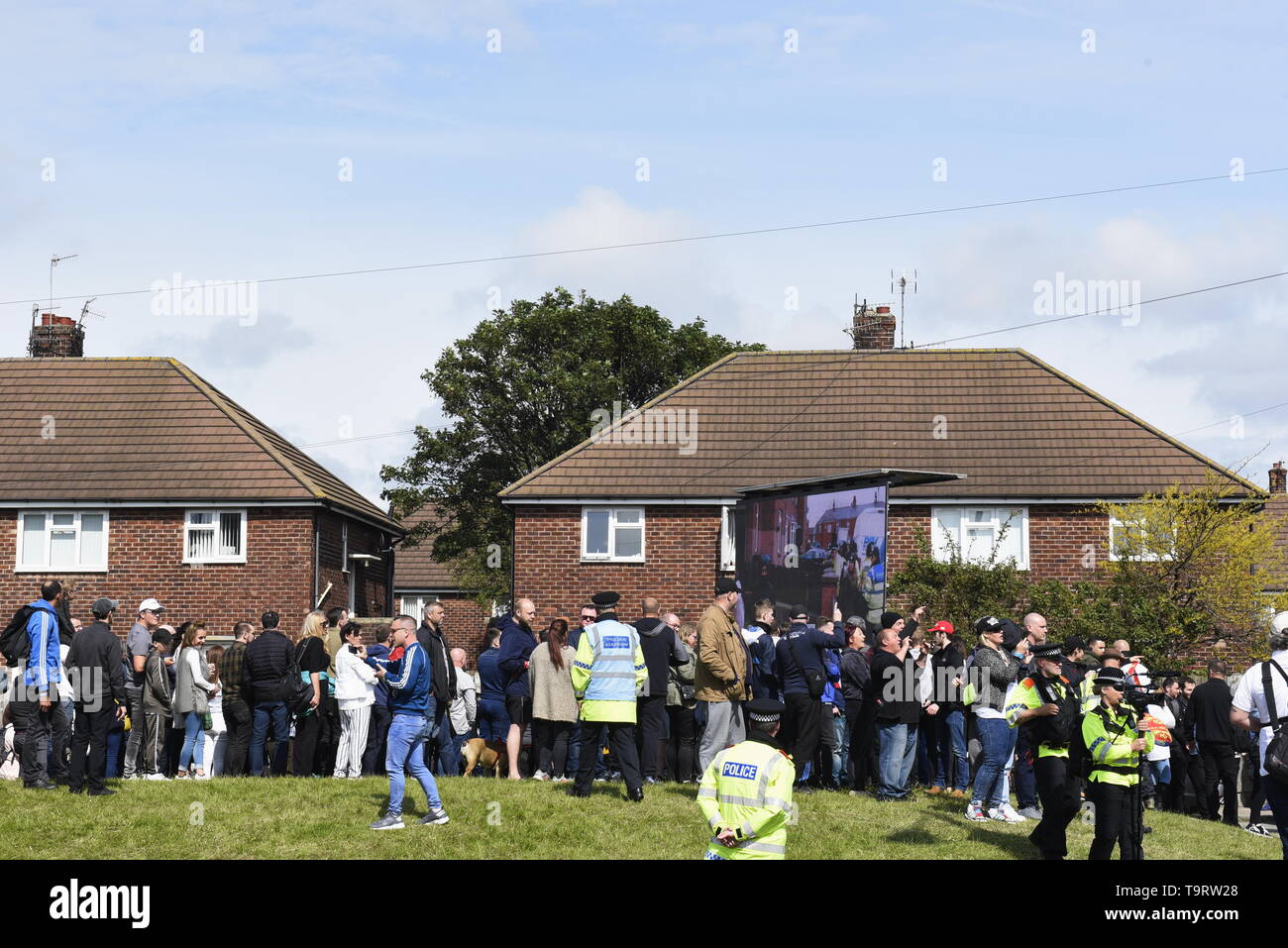 Supporters of Tommy Robinson, who is campaigning in Bootle, Liverpool ahead of this weeks European Elections.  Police kept supporters and counter-demonstrators apart but clashed with counter-demonstrators ahead of Tommy Robinson's arrival. Credit David J Colbran Stock Photo