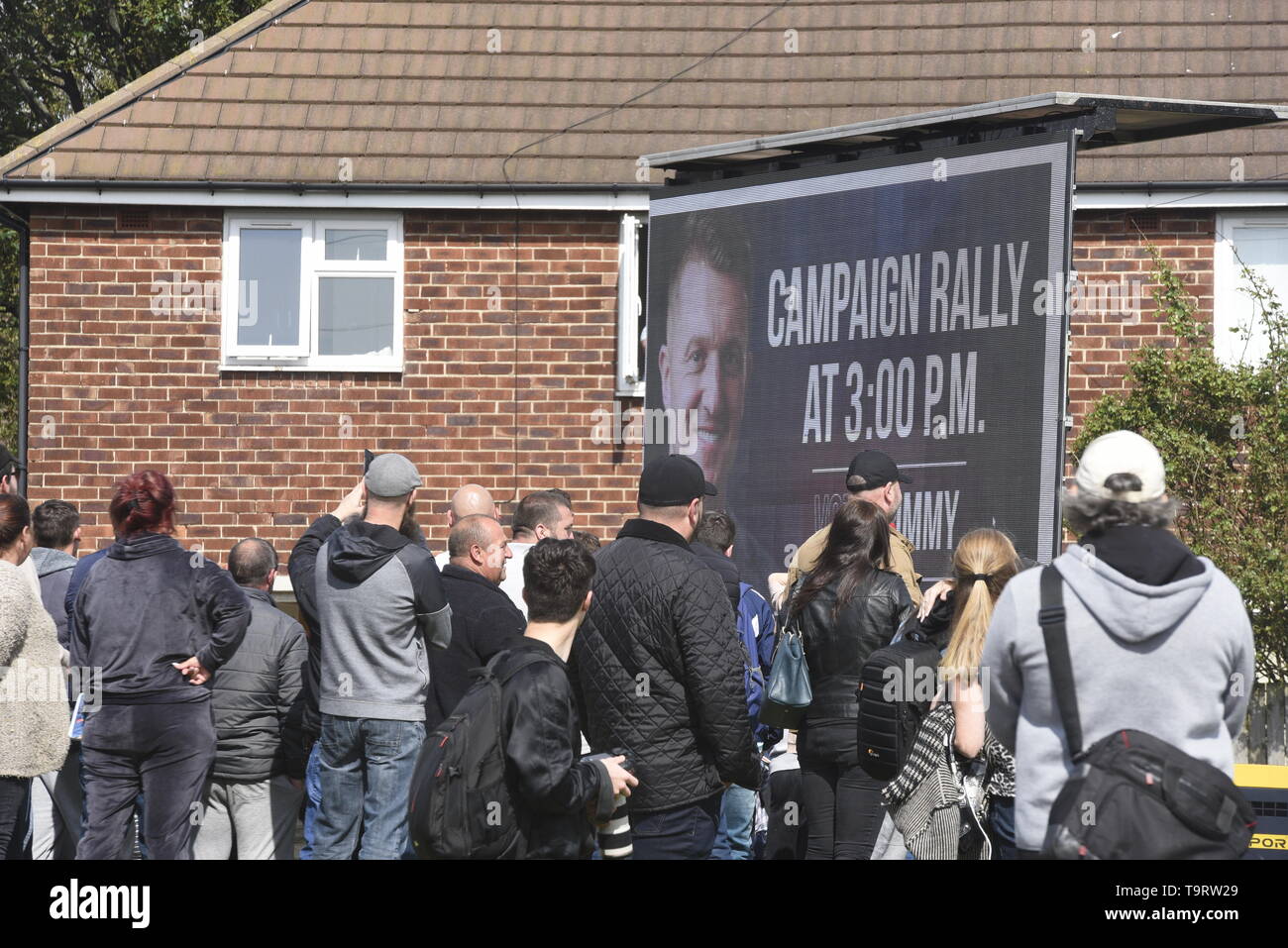 Supporters of Tommy Robinson, who is campaigning in Bootle, Liverpool ahead of this weeks European Elections.  Police kept supporters and counter-demonstrators apart but clashed with counter-demonstrators ahead of Tommy Robinson's arrival. Credit David J Colbran Stock Photo