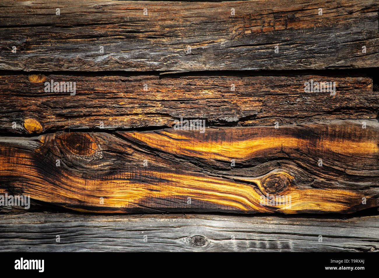 Colourful old wooden board with knots Stock Photo