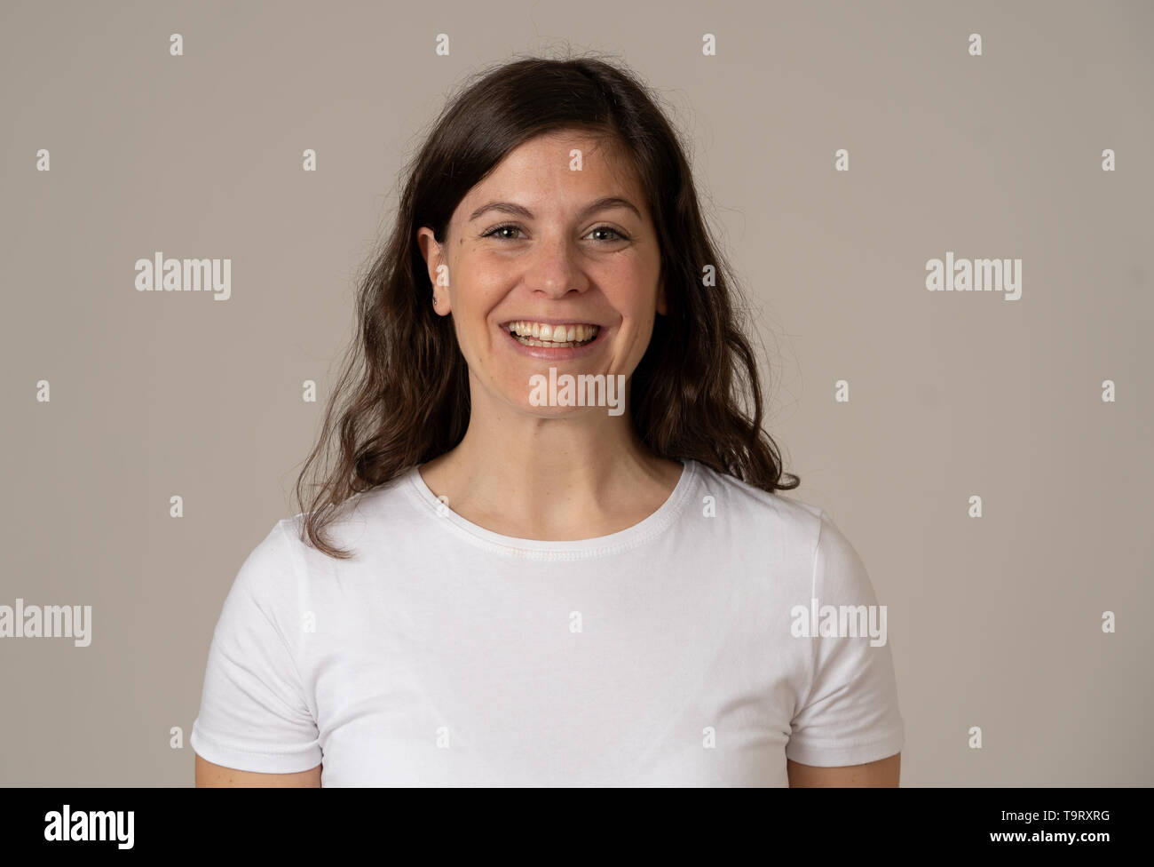 People, Positive human facial expressions and emotions concept. Close up portrait of attractive young caucasian woman with happy face and beautiful sm Stock Photo