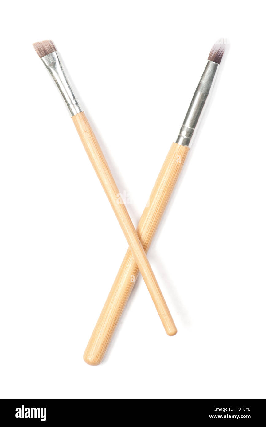 Set of thin makeup brushes isolated on white Stock Photo