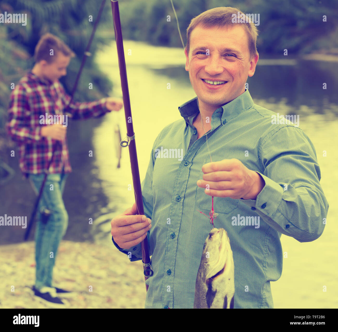 Freshwater fishing shore pole hi-res stock photography and images - Alamy