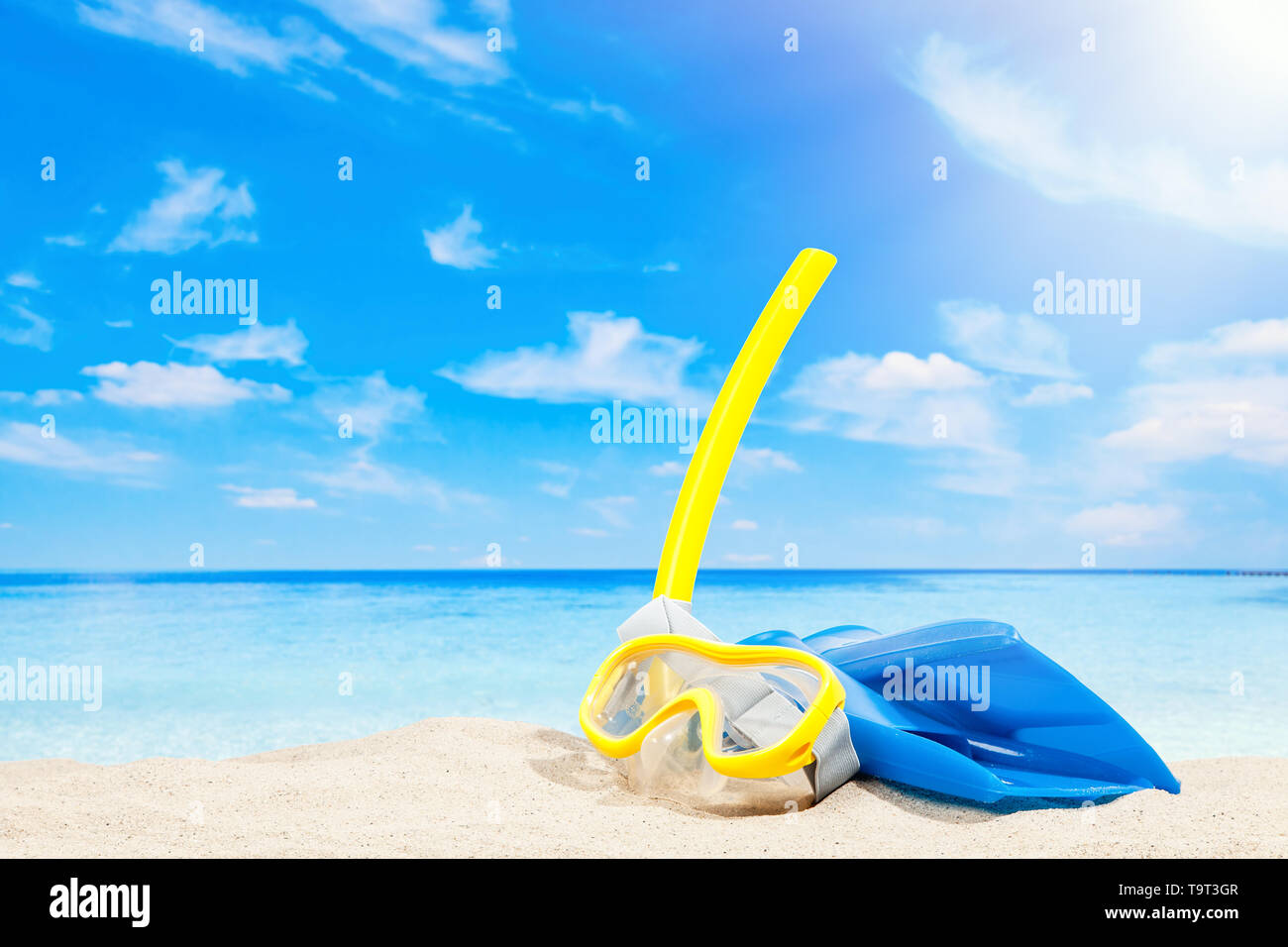 Snorkeling equipment on a sandy beach Stock Photo