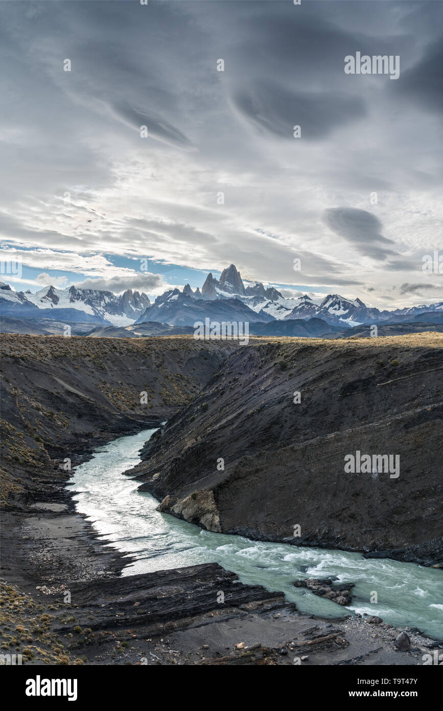 The Fitz Roy Massif at sunset, viewed over the canyon of the Rio de las Vueltas in Los Glaciares National Park near El Chalten, Argentina.  A UNESCO W Stock Photo