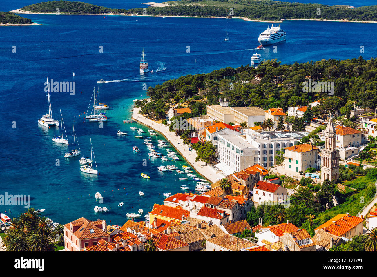 View at amazing archipelago with boats in front of town Hvar, Croatia. Harbor of old Adriatic island town Hvar. Popular touristic destination of Croat Stock Photo