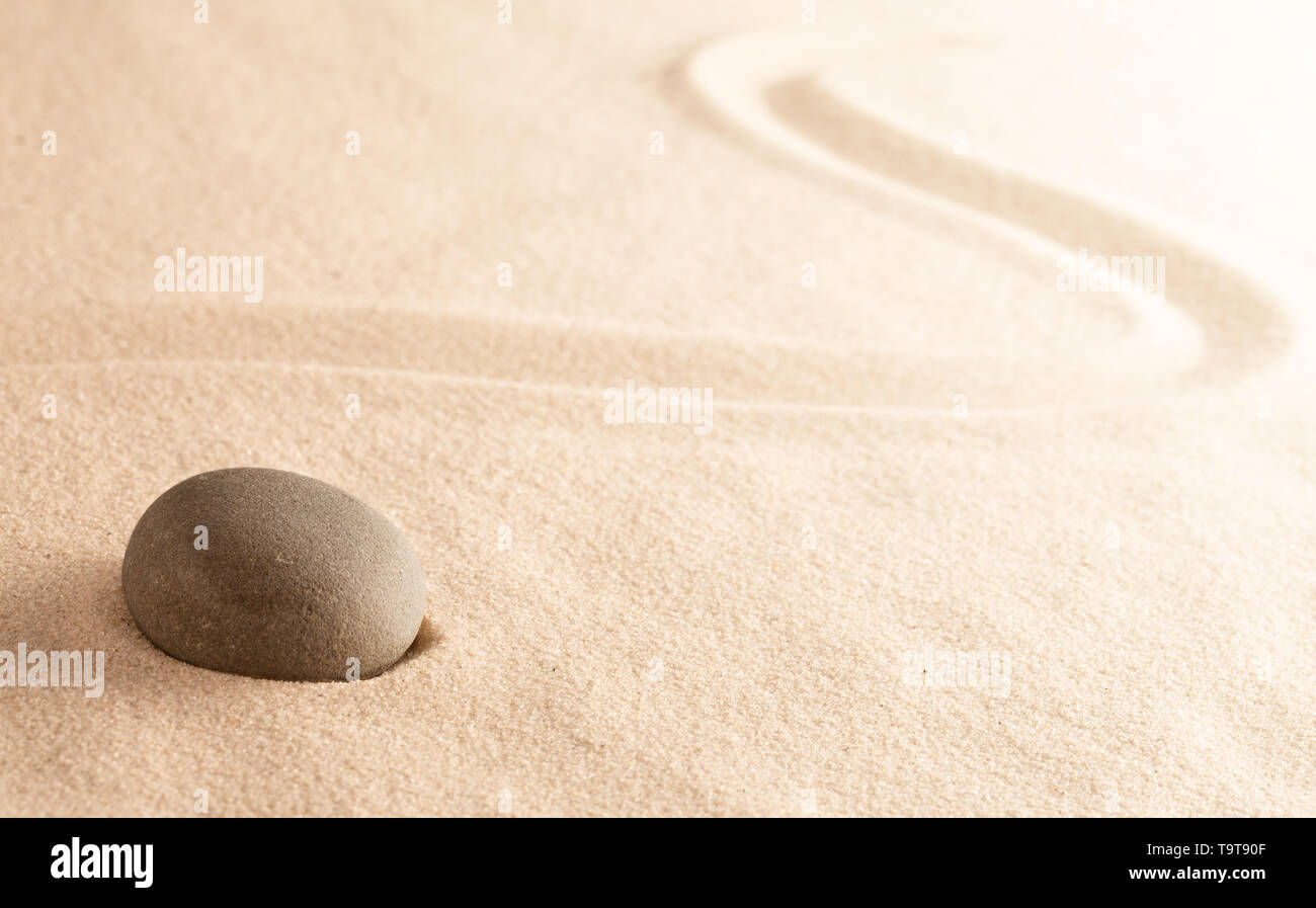 Mindfulness zen meditation stone for concentration and focus. Stock Photo