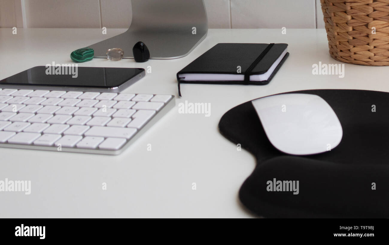 Desk table, office table with computer keyboard. Business table background.return work Stock Photo