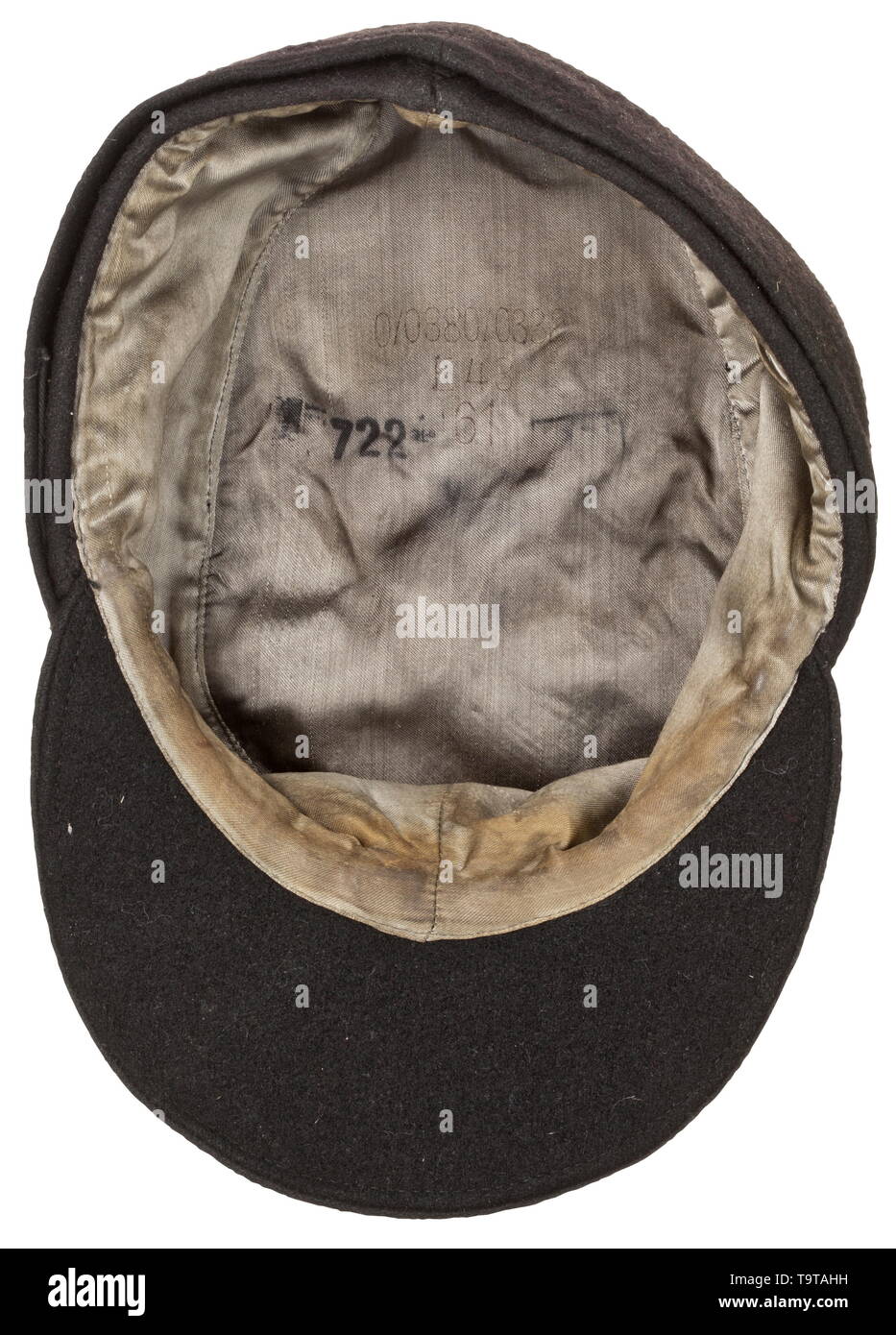 A field cap M 43 for enlisted men/NCOs of panzer troops Depot piece in black cotton cloth (somewhat roughened), grained zinc buttons, BeVo-woven cap trapezoid on a black base (machine-stitched), grey silk liner with RB-, size- and depot stamps. In used condition. historic, historical, army, armies, armed forces, military, militaria, object, objects, stills, clipping, clippings, cut out, cut-out, cut-outs, 20th century, Editorial-Use-Only Stock Photo