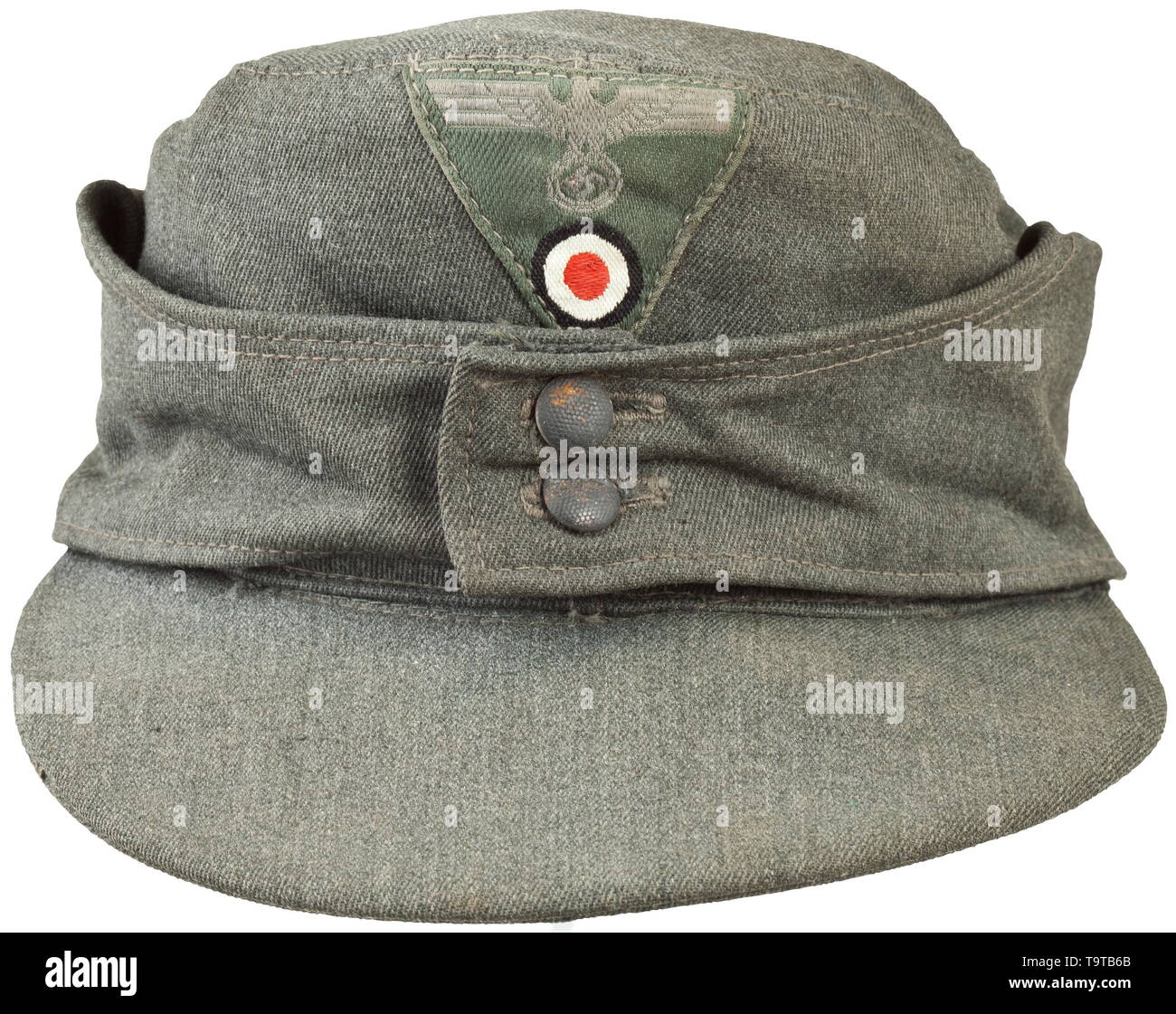 A field cap M 43 for enlisted men/NCOs of the army depot piece from looted Italian cloth Grained iron buttons, machine-stitched cap trapezoid (machine-embroidered issue), grey silk liner with RB-, size- and depot stamps. Only lightly used. historic, historical, army, armies, armed forces, military, militaria, object, objects, stills, clipping, clippings, cut out, cut-out, cut-outs, 20th century, Editorial-Use-Only Stock Photo
