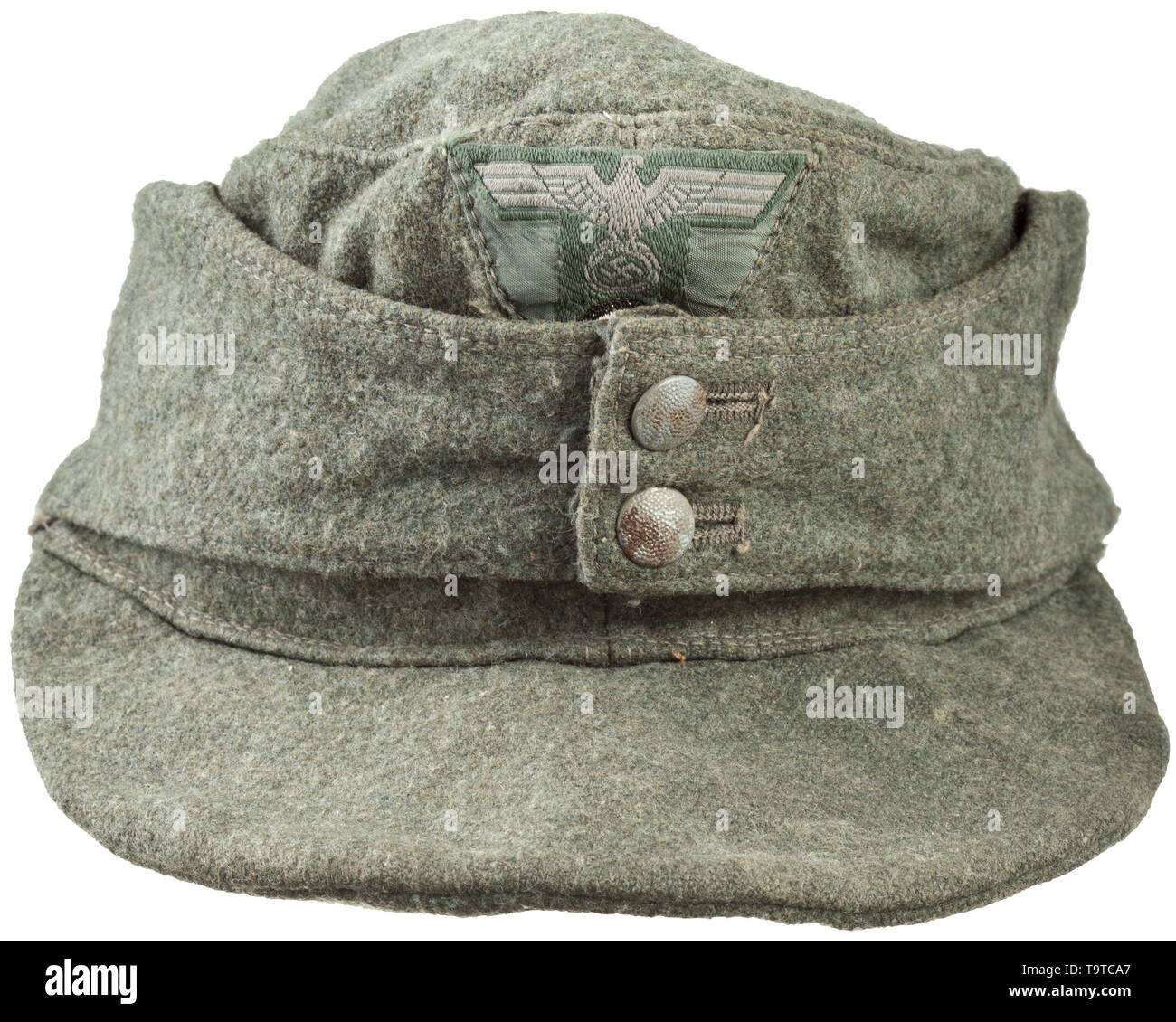 A field cap M 43 for enlisted men/NCOs of the army Depot piece in field-grey woollen cloth, grained zinc buttons, BeVo-woven cap trapezoid (machine-stitched), grey silk liner with RB-, size- ('56') and depot stamps from the year 1943. In used condition. historic, historical, army, armies, armed forces, military, militaria, object, objects, stills, clipping, clippings, cut out, cut-out, cut-outs, 20th century, Editorial-Use-Only Stock Photo