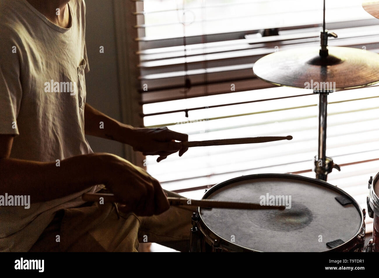Drummer playing his rudiments on snare drum Stock Photo Alamy