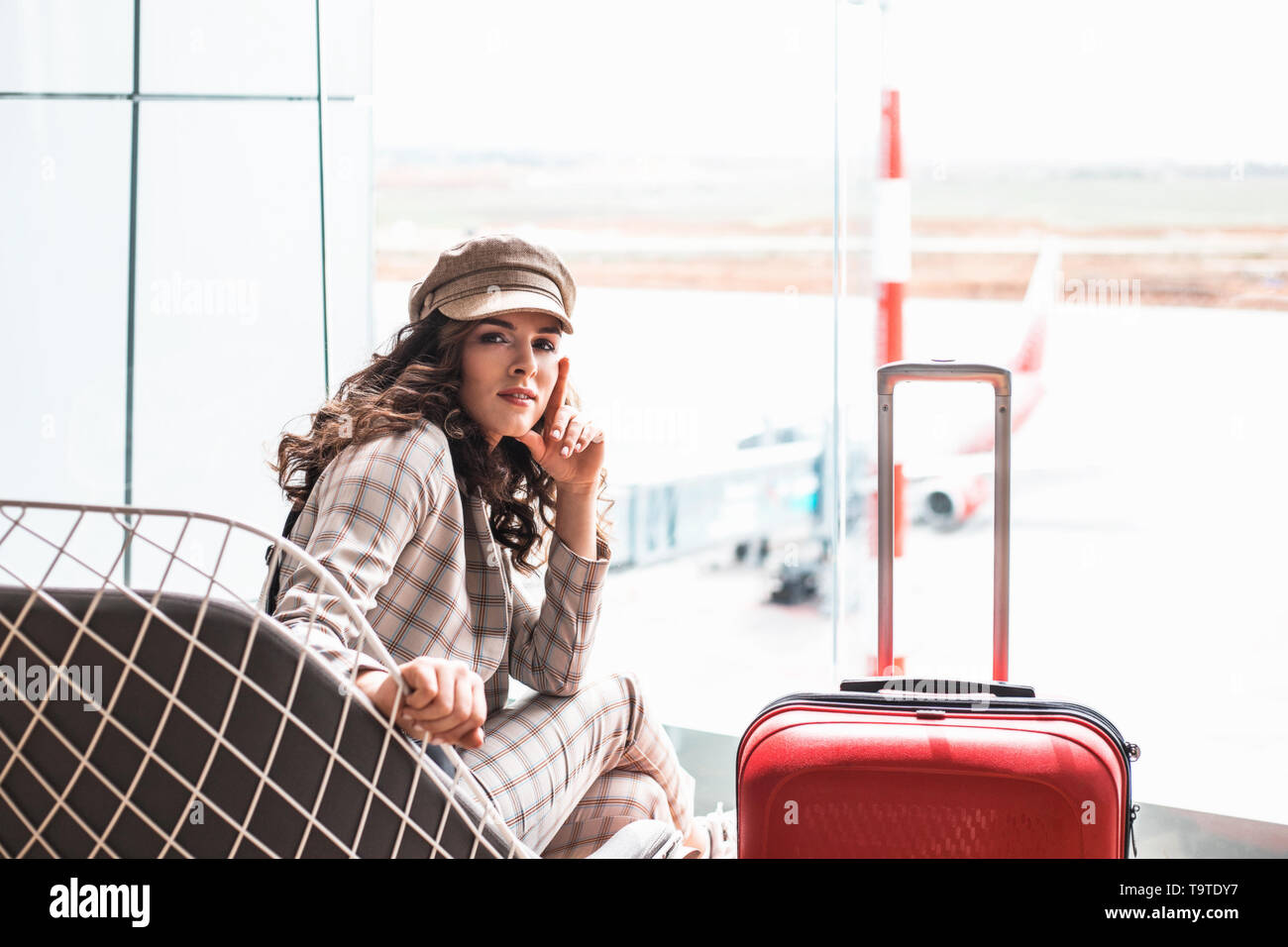 Woman Airport Suit Check In High Resolution Stock Photography and ...