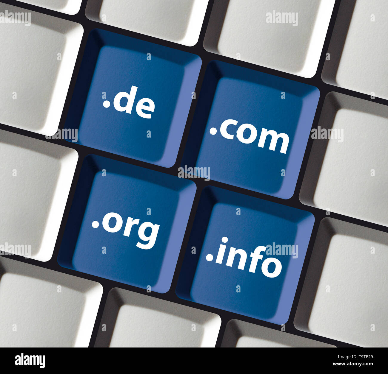 Domain extensions on blue pc keyboard keys Stock Photo Alamy