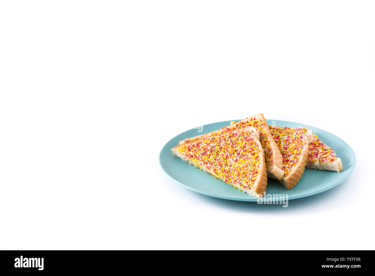 Traditional Australian fairy bread on plate isolated on white background. Copyspace Stock Photo