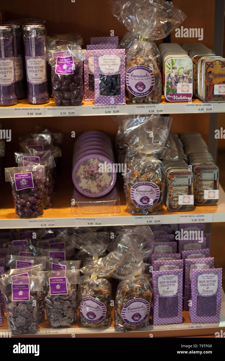 Various violet flavoured sweets and chocolates on sale, these are typical  in Toulouse, Occitanie, France Stock Photo