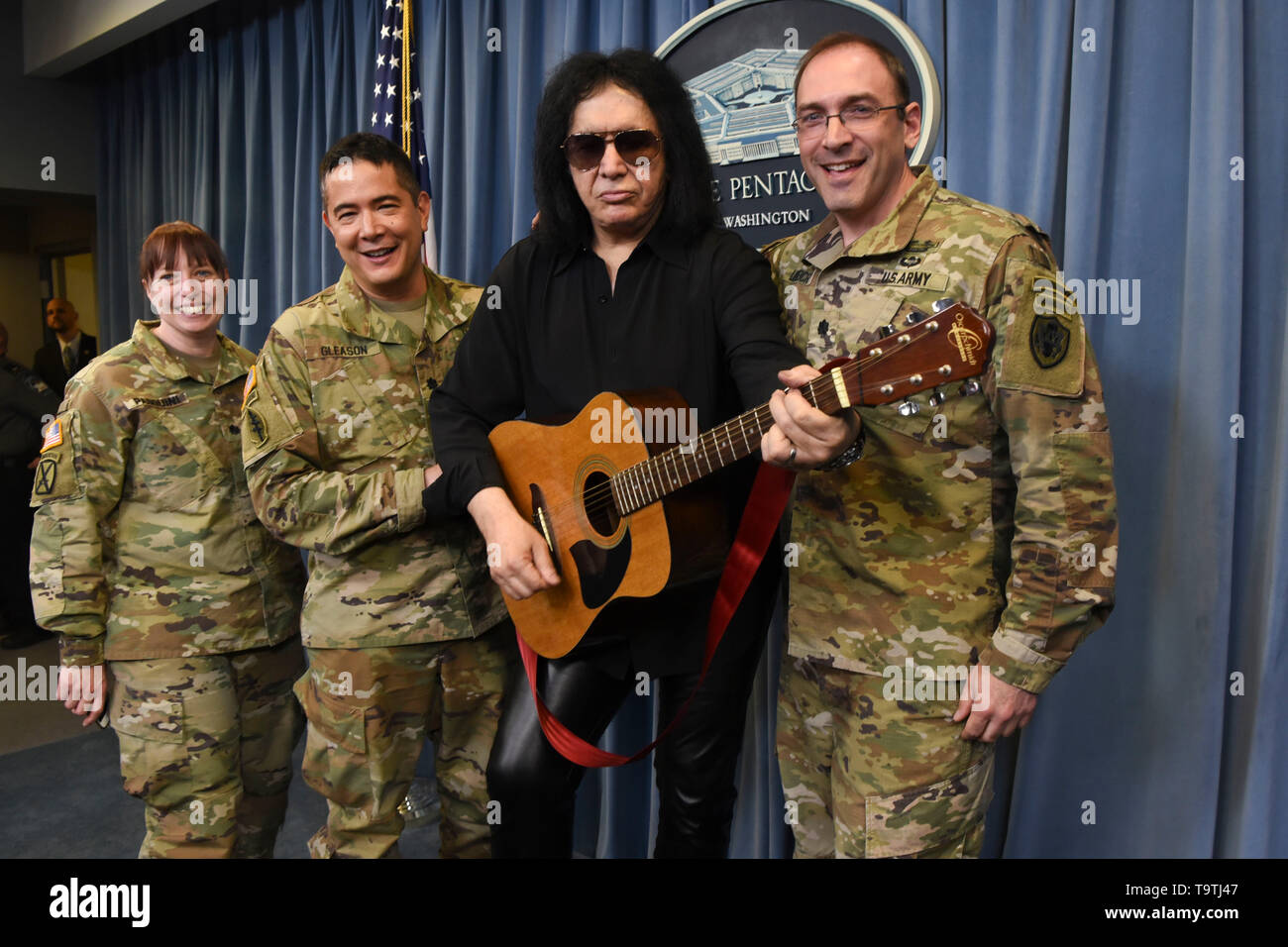 Rock legend Gene Simmons of KISS poses with soldiers during a meet-and-greet at the Pentagon May 16, 2019 in Washington, D.C. Stock Photo