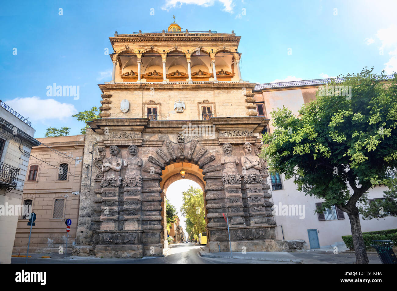 Cityscape with medieval gate Porta Nuova (New Gate) in Palermo. Sicily, Italy Stock Photo