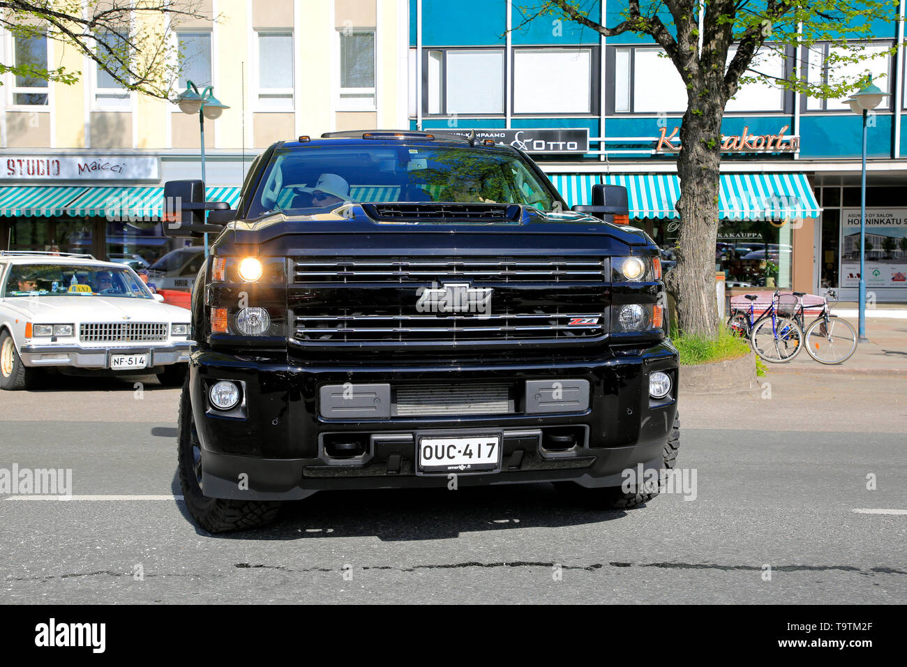 Salo, Finland. May 18, 2019. Black Chevrolet Silverado Z71 backing up onto parking space. Salon Maisema Cruising 2019 featured over 450 vehicles. Stock Photo