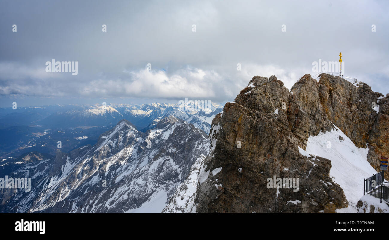 Summit cross on the top of the Zugspitze, the highest mountain of Germany in the Bavarian Alps, copy space Stock Photo