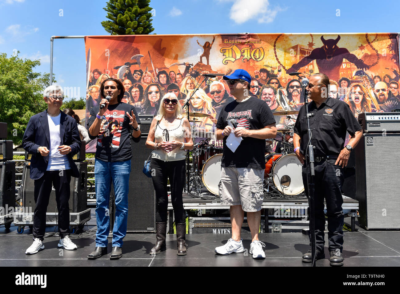 Wendy Dio and Eddie Trunk with the staff and doctors of the Dio Cancer Fund on stage explaining all the new discoveries the charity has made. Stock Photo