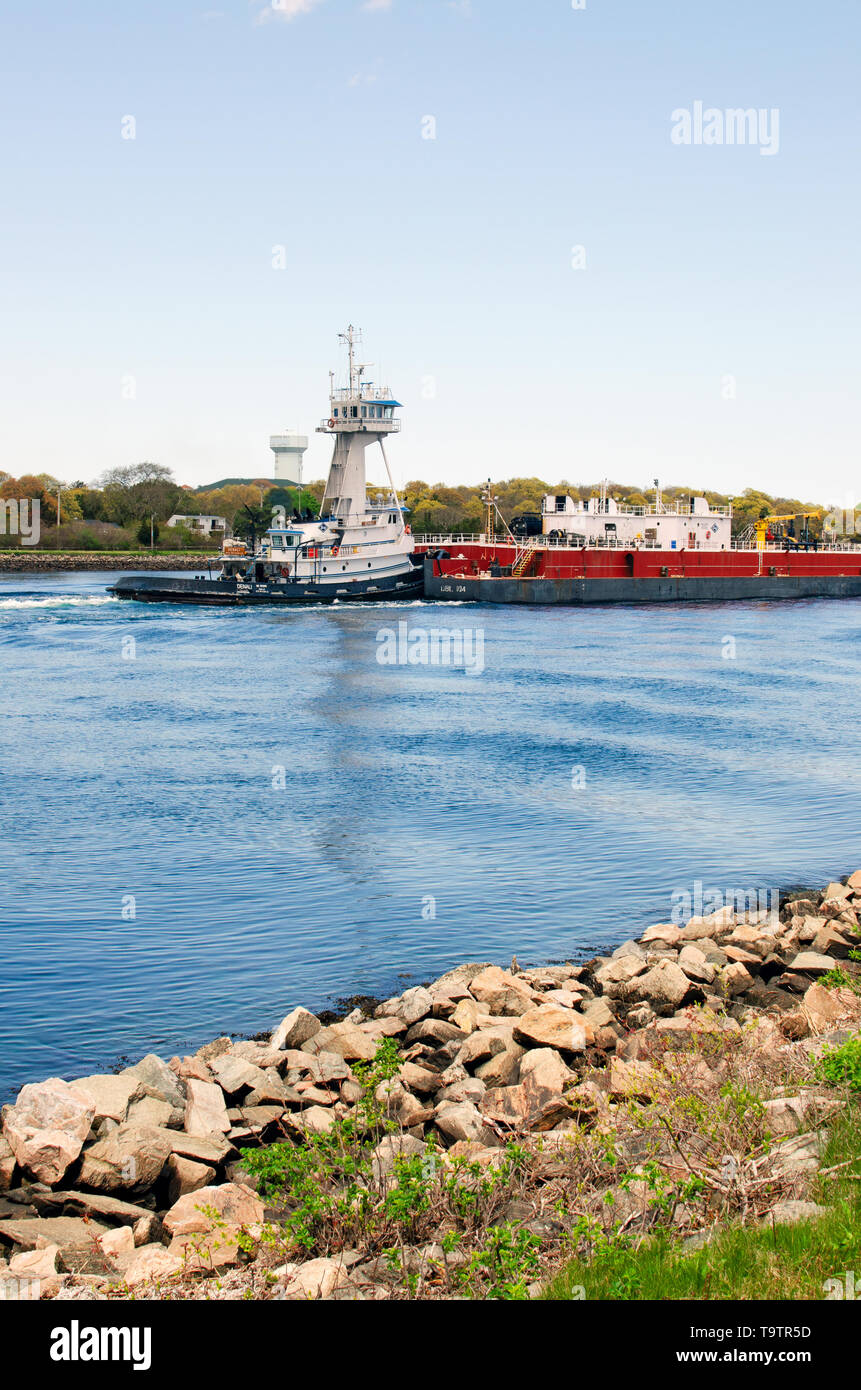 Tug boat pushing fuel barge through Cape Cod Canal Stock Photo Alamy