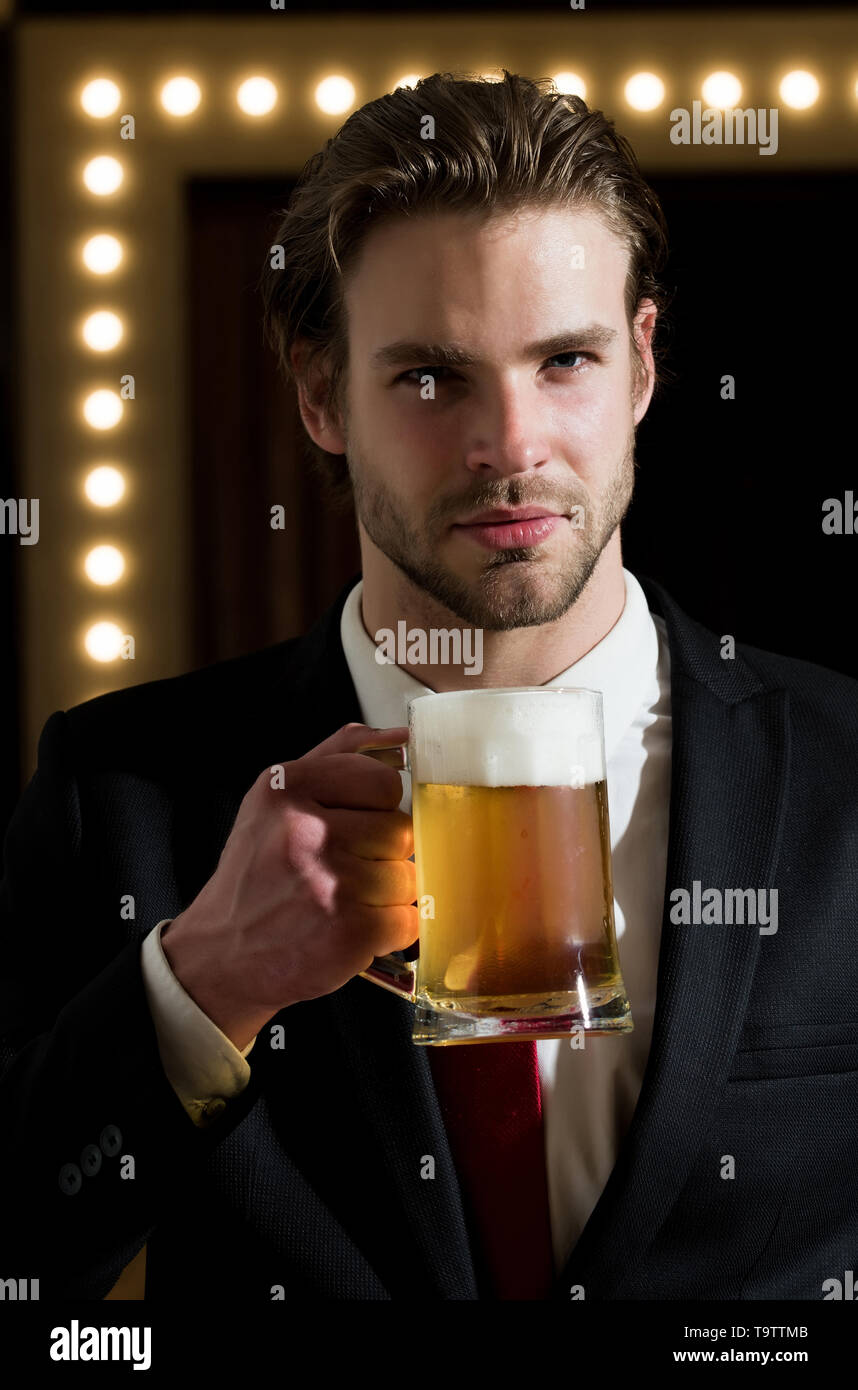 man or businessman hold beer glass, meeting and relax Stock Photo