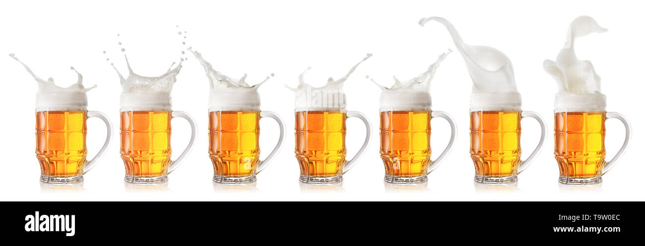 Splash of foamy light beer in mug isolated on white background. Collection, set Stock Photo
