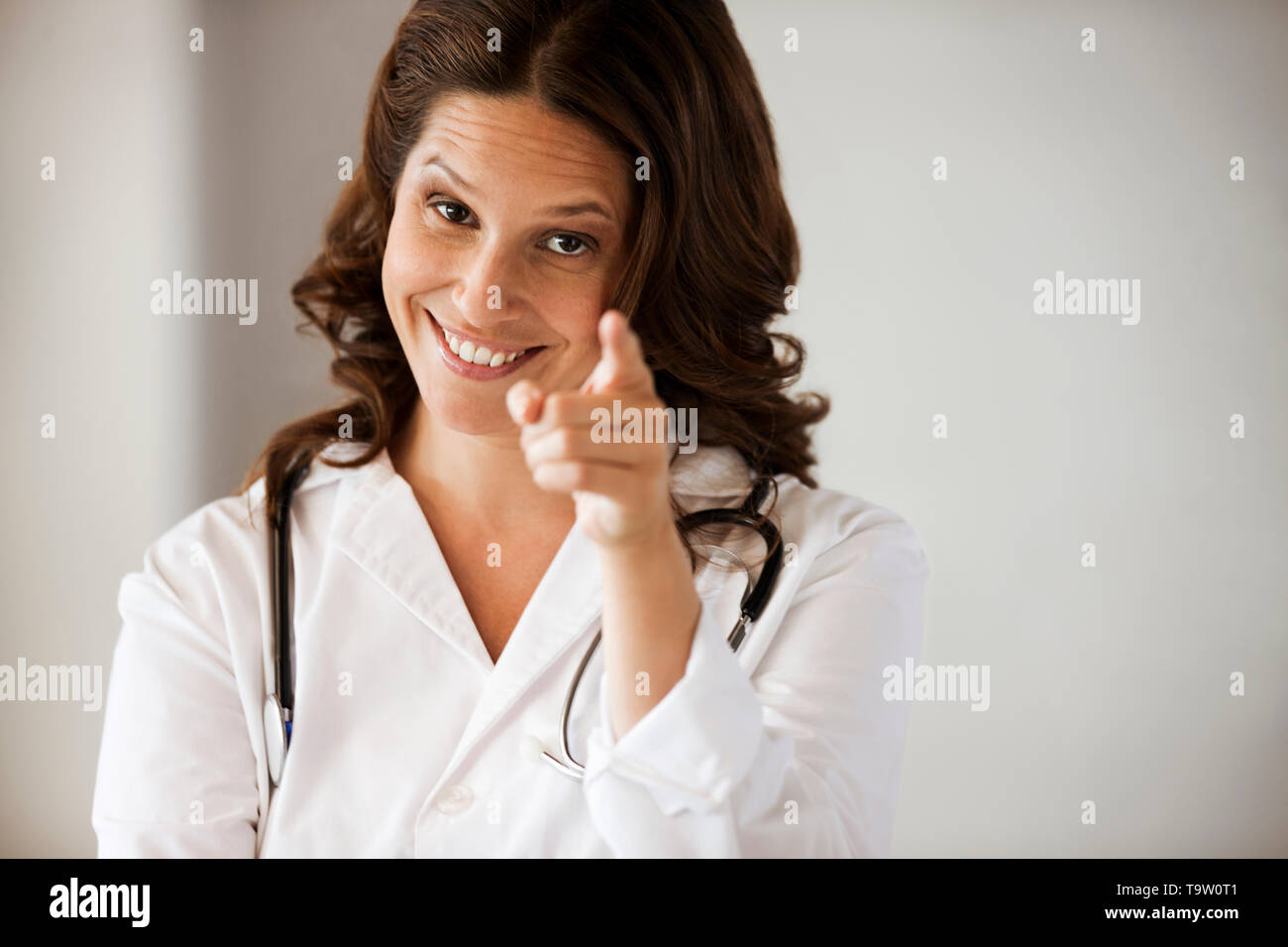 Doctor Point Woman Doctor pointing hi-res stock photography and images - Alamy