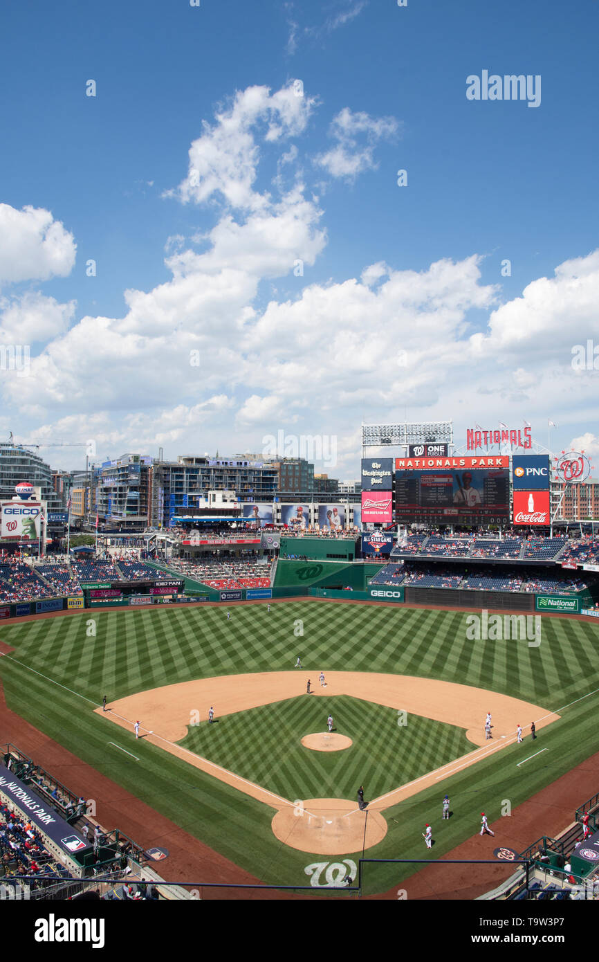 Blue skies and white clouds shine over Nationals Park baseball stadium in Washington, DC Stock