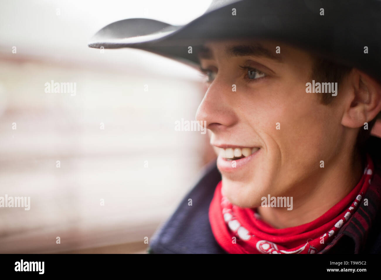 Portrait of young adult cowboy. Stock Photo