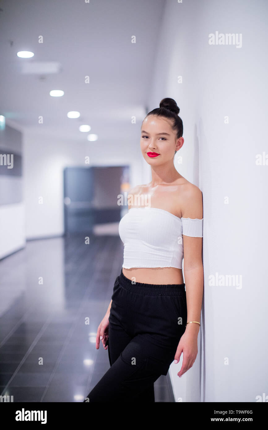 20 May 2019, North Rhine-Westphalia, Duesseldorf: Cäcilia (19), participant  in the final of Germany's next Topmodel, is standing in a corridor in the  ISS Dome. The GNTM final will be broadcast live