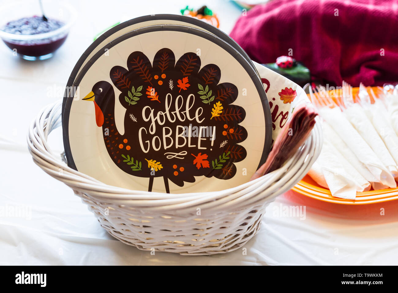 Thanksgiving themed plates, napkins, and forks Stock Photo Alamy