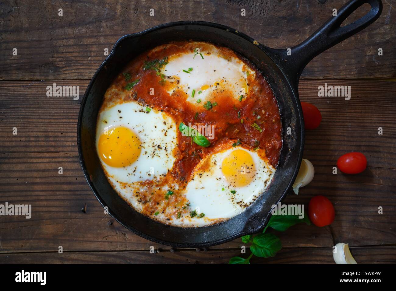 Homemade Shakshouka Middle Eastern breakfast Eggs poached in spicy