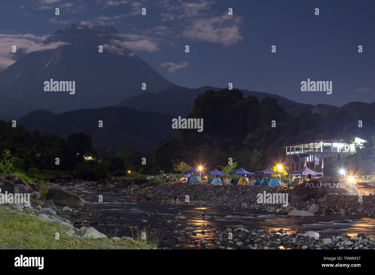 Mount Kinabalu Seen At Night From Melangkap With Views Of The Polumpung Melangkap View Campsite On The Kadamaian River Sabah Malaysia Stock Photo Alamy