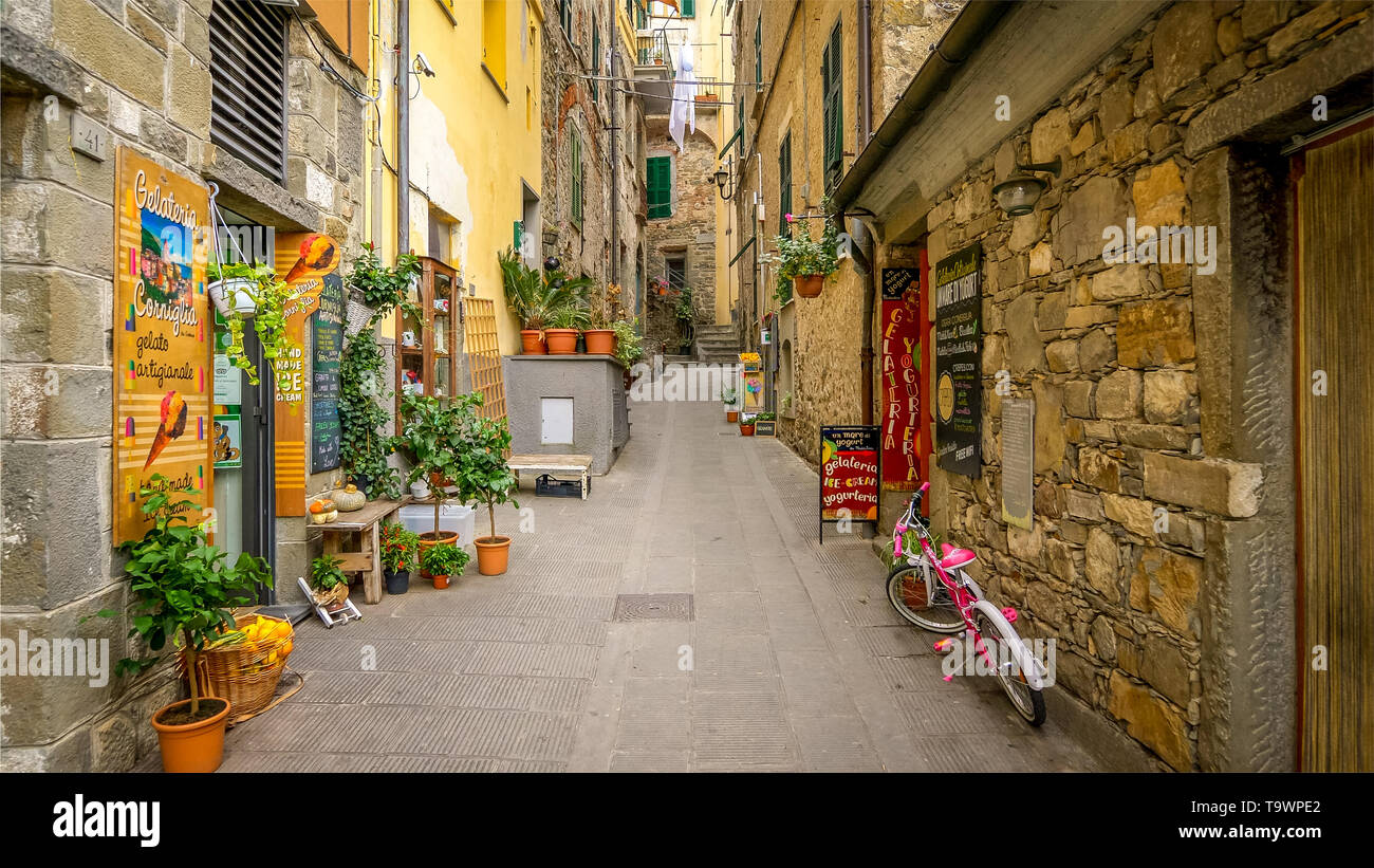 Narrow Alley in Cinque Terre Village of Corniglia, La Spezia, Italy Stock Photo
